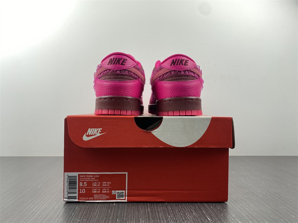 from Nike Spruces Up Its Dunk Low Team Red/Pink DQ9324-600