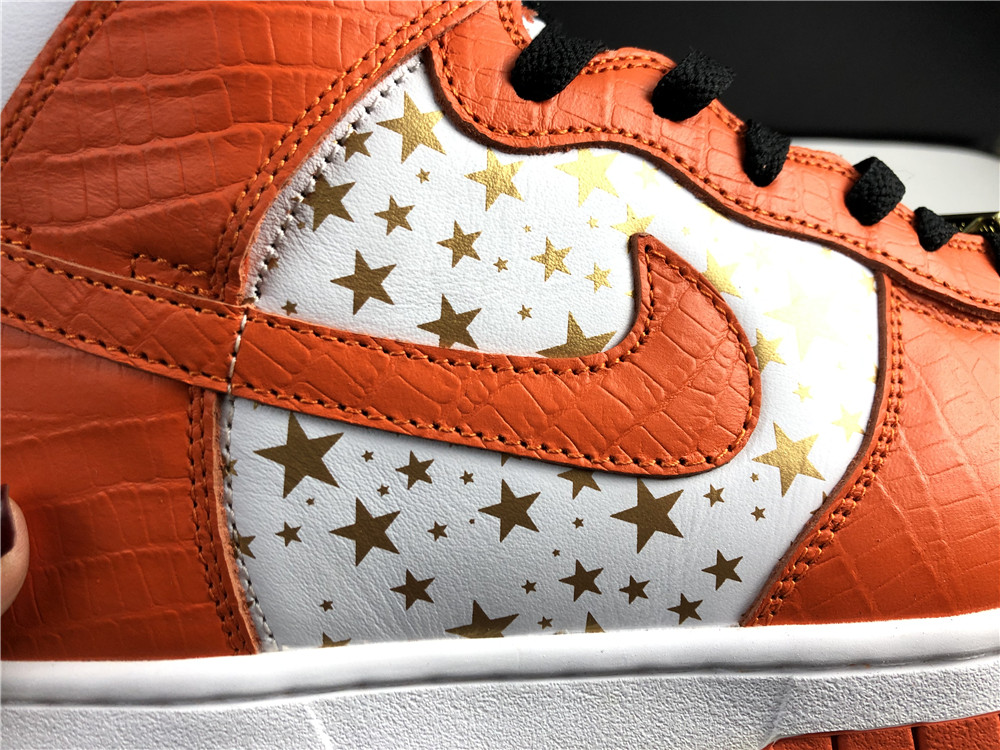 from Supreme x Nike SB Dunk High”Stars Orange”