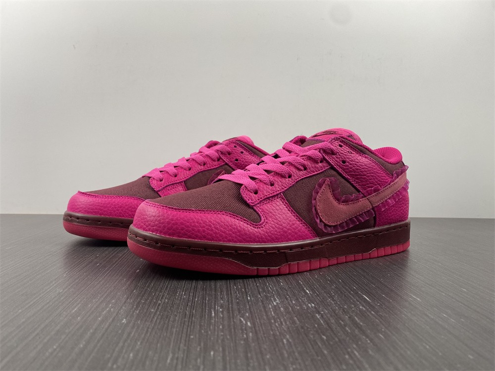 from Nike Spruces Up Its Dunk Low Team Red/Pink DQ9324-600