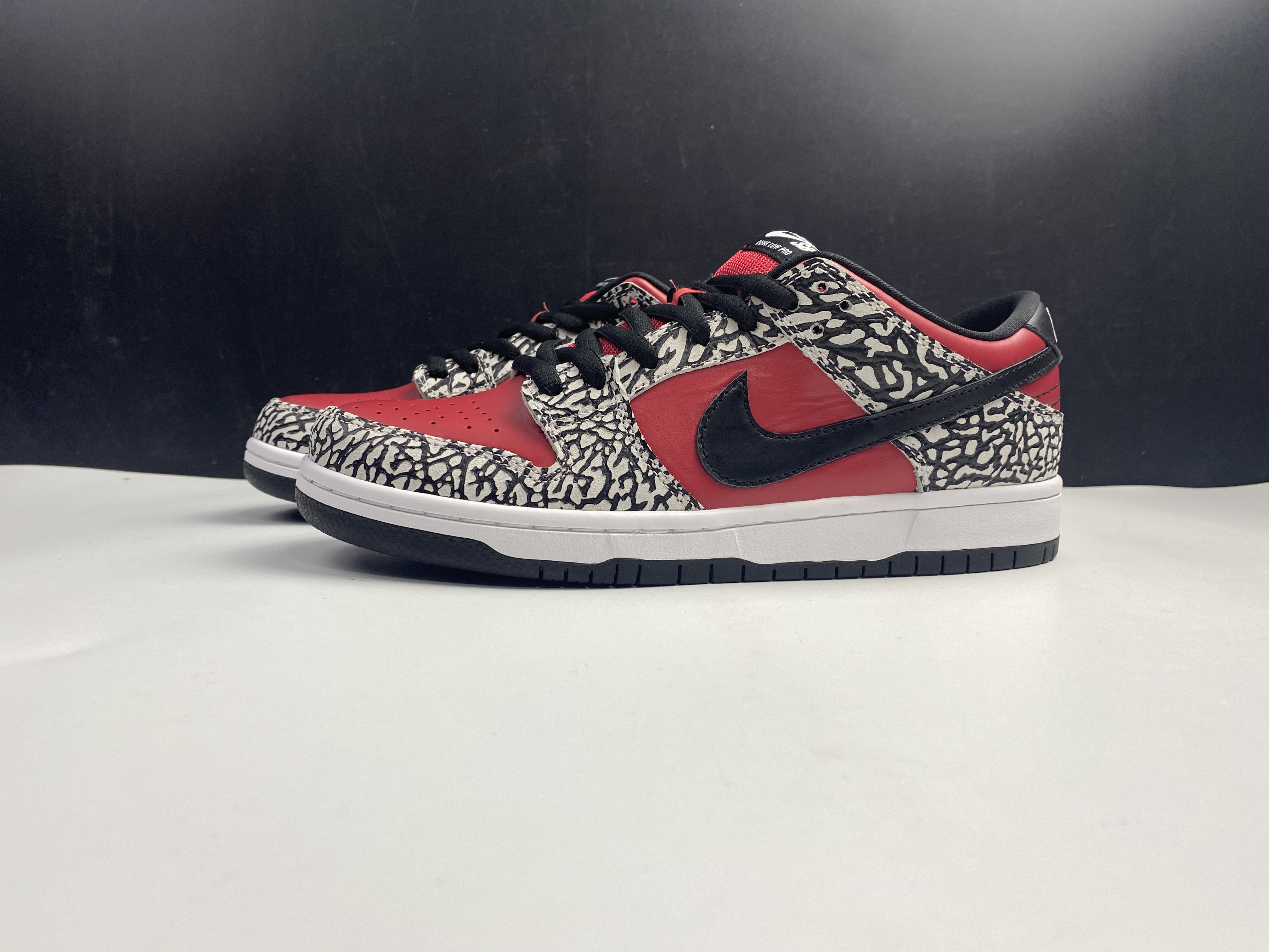 from NIKE Dunk SB x Supreme 313170-600